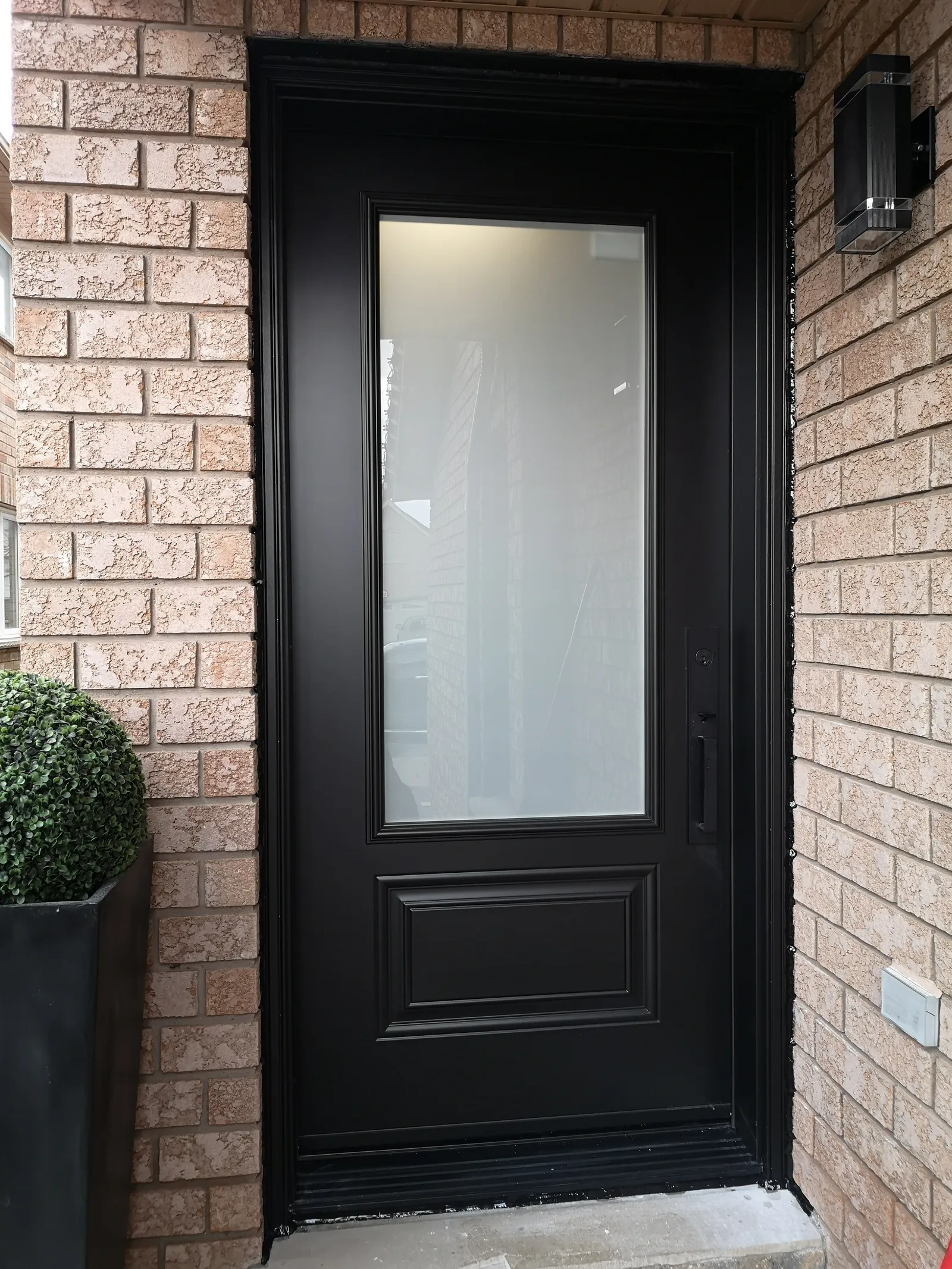 Black modern door with full frosted glass