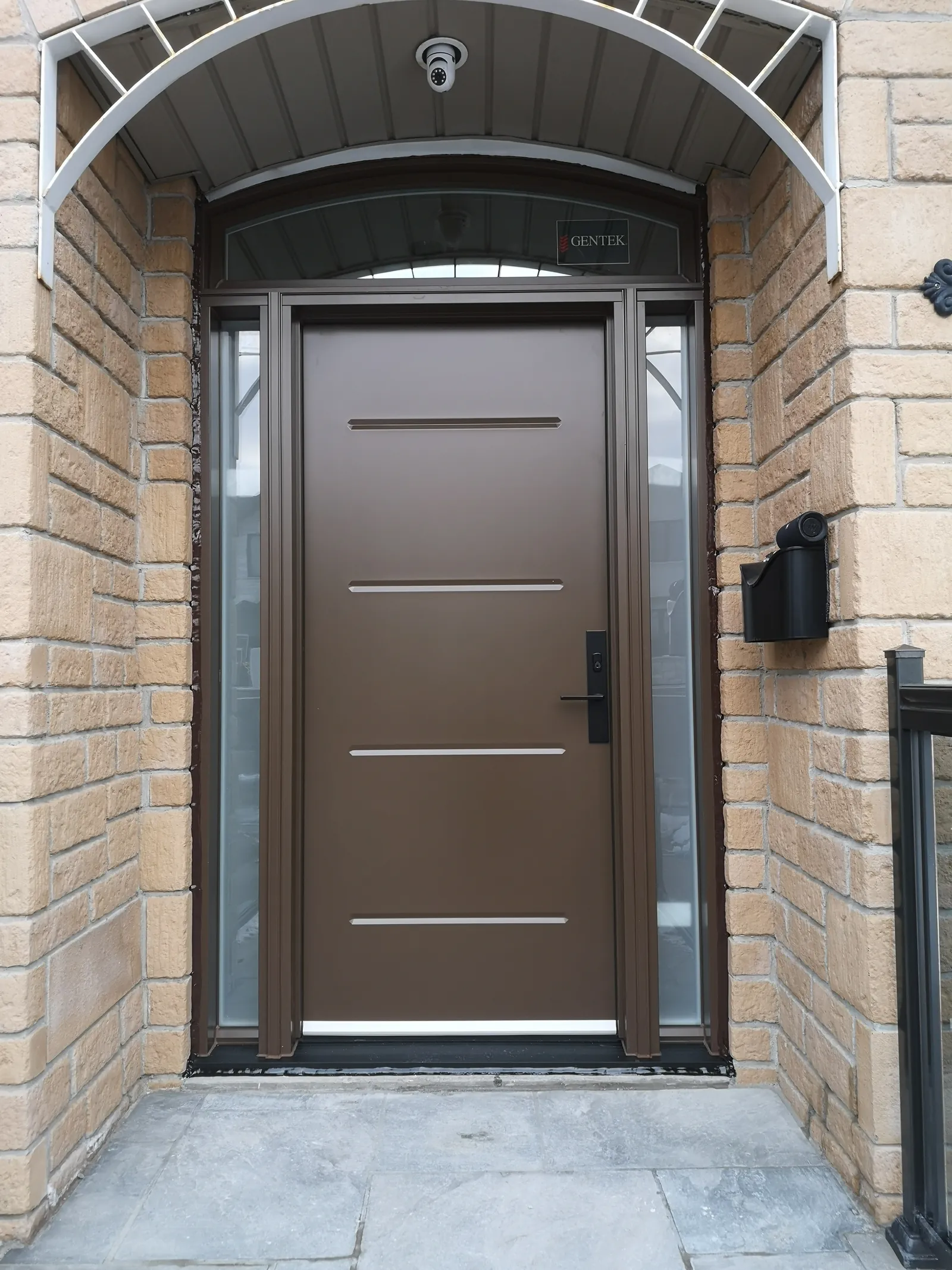 Brown modern door with arched transom
