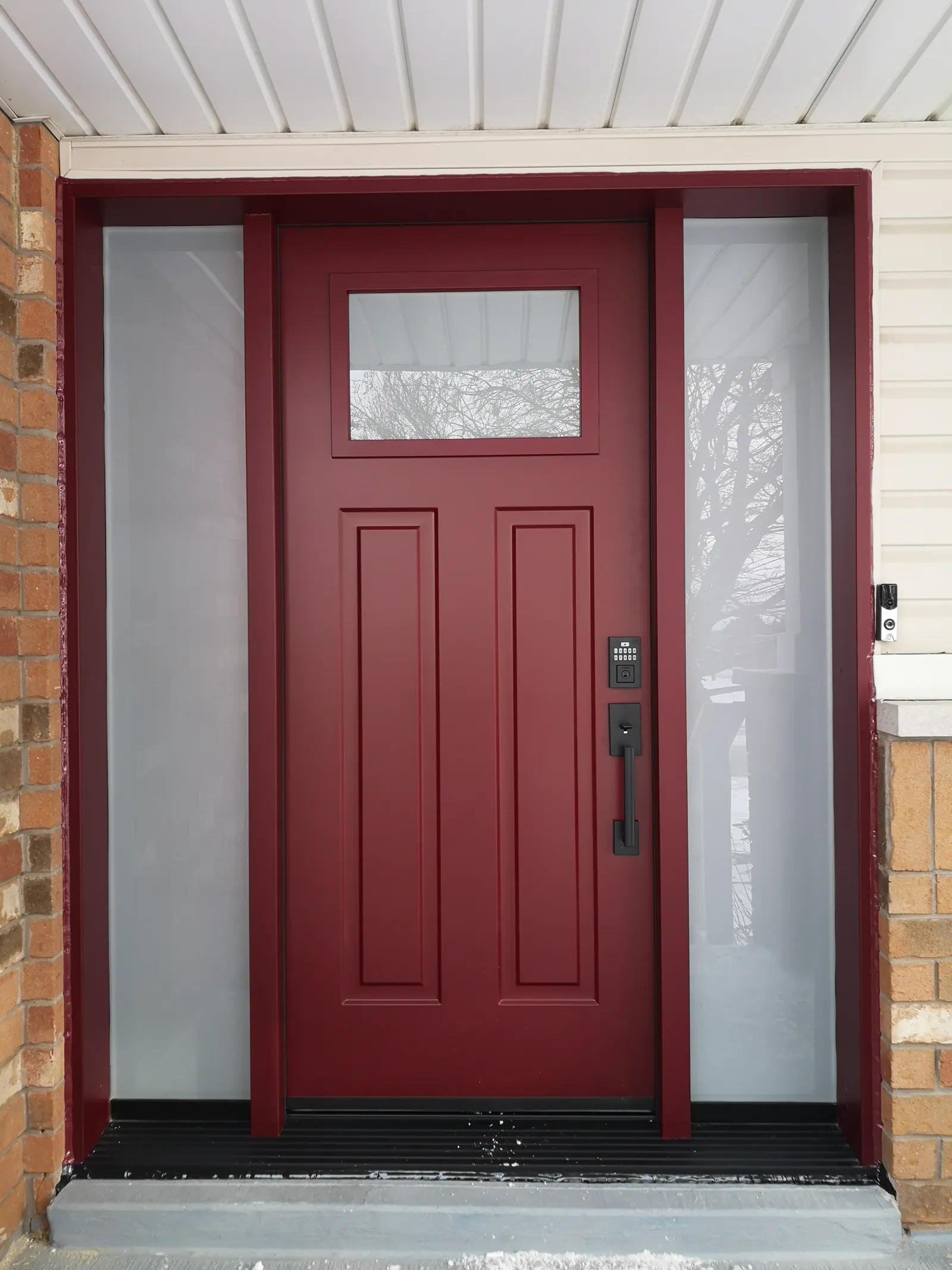 Burgundy craftsman door with sidelites