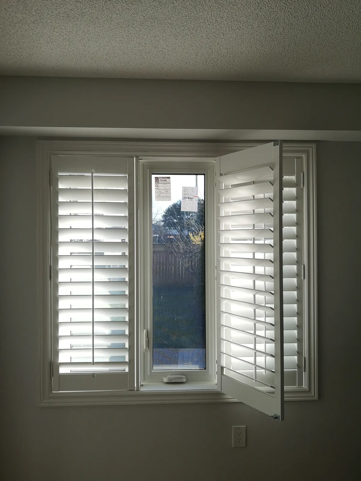 White interior plantation shutters