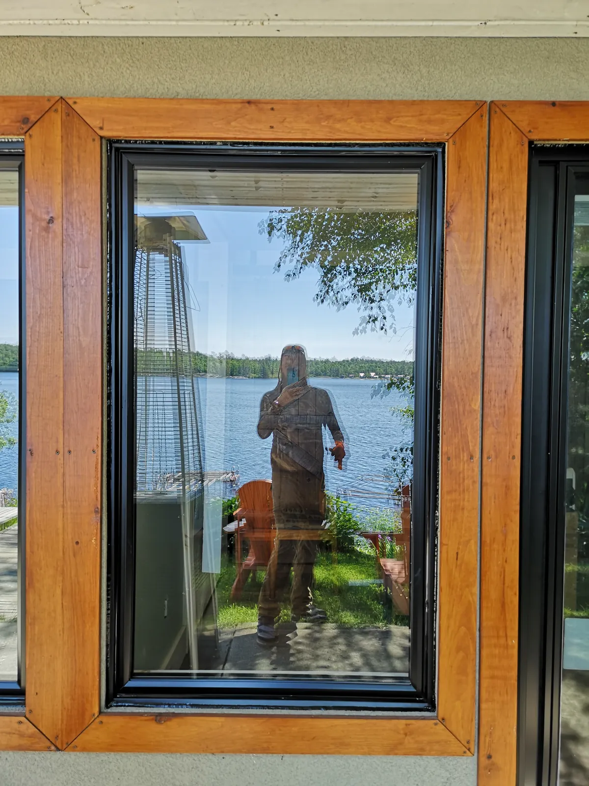 Black sliding patio door, brick exterior