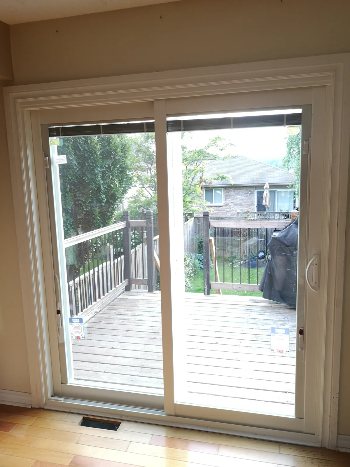 White sliding patio door, deck view